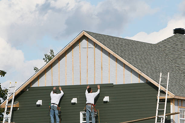 Professional Storm Damage Siding Repair technician working in Morven, NC